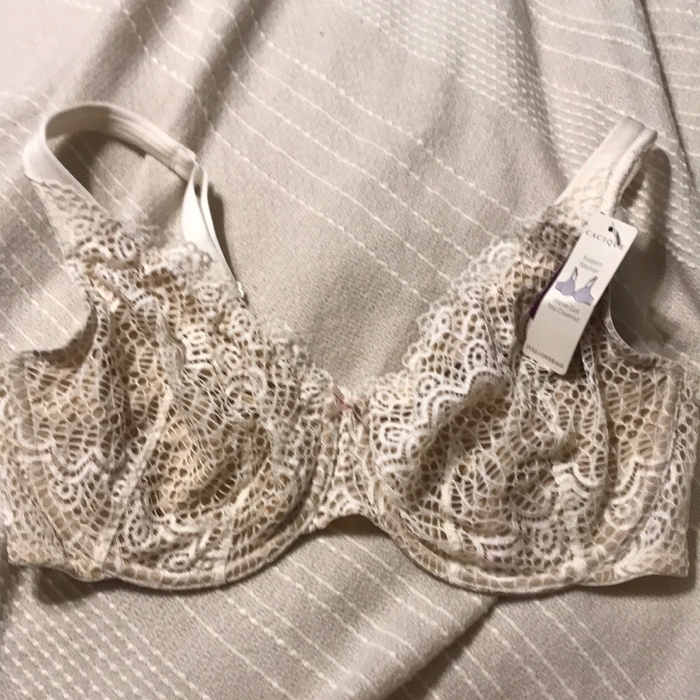 Nude and white lace cupless bra